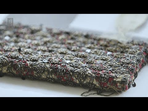Cleaning a five-hundred-year-old embroidered book