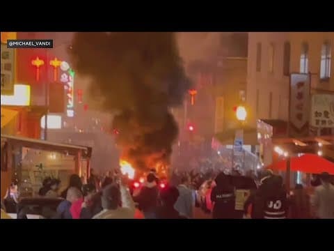 Waymo robotaxi burns on a Chinatown street