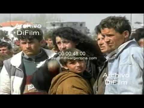 A flotilla leaves for Italy, 1997