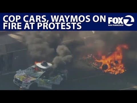 Driverless cars burned during immigration enforcement protests