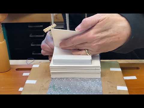 Sewing a medieval girdle book