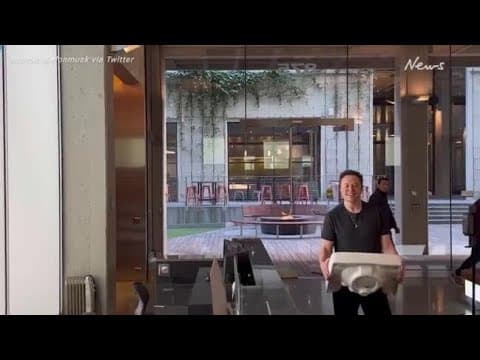 Musk Walks Into Twitter HQ With a Sink