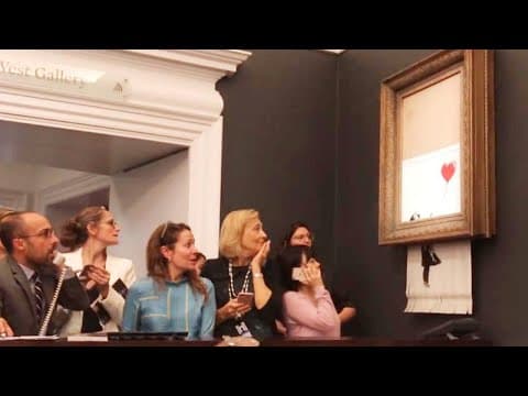 Banksy shreds Girl with Balloon at Sotheby's