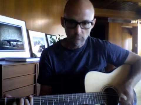 Moby in his studio playing guitar