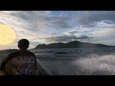 Headed to Savo Island from Guadalcanal in a small boat and got soaked by the waves, Solomon Islands