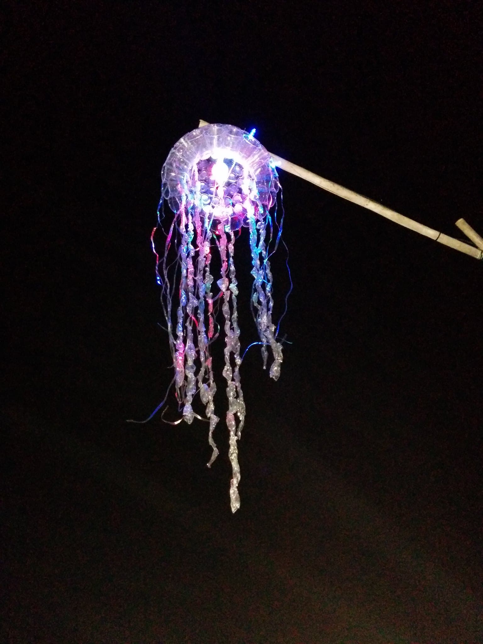 Illuminated jellyfish sculpture overhead, Boom 2014