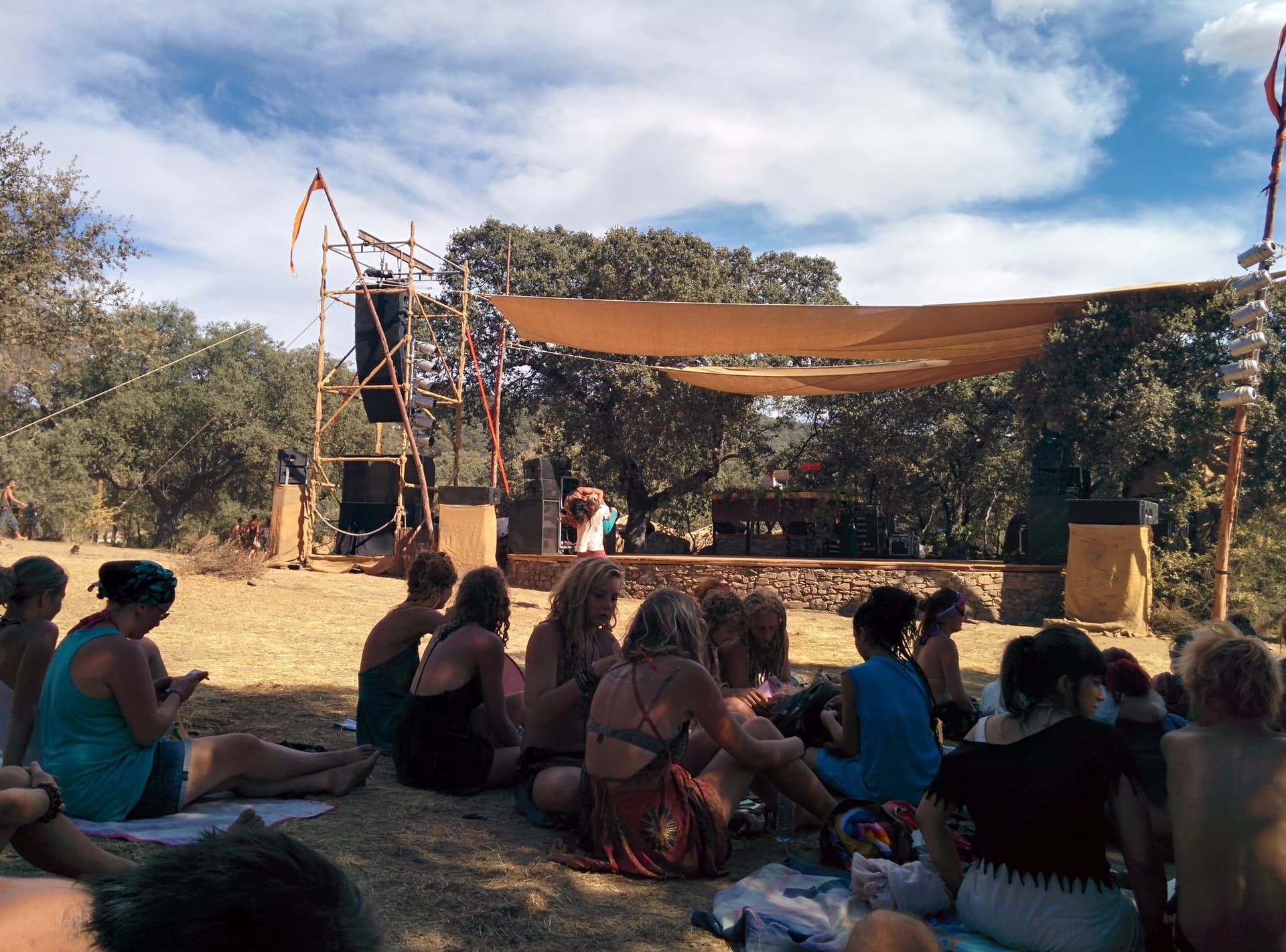 Audience seated before a shaded stage, Boom 2014