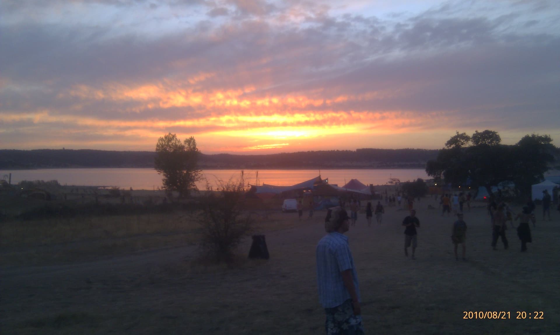 Sunset over the reservoir with people on the shore, Boom 2010