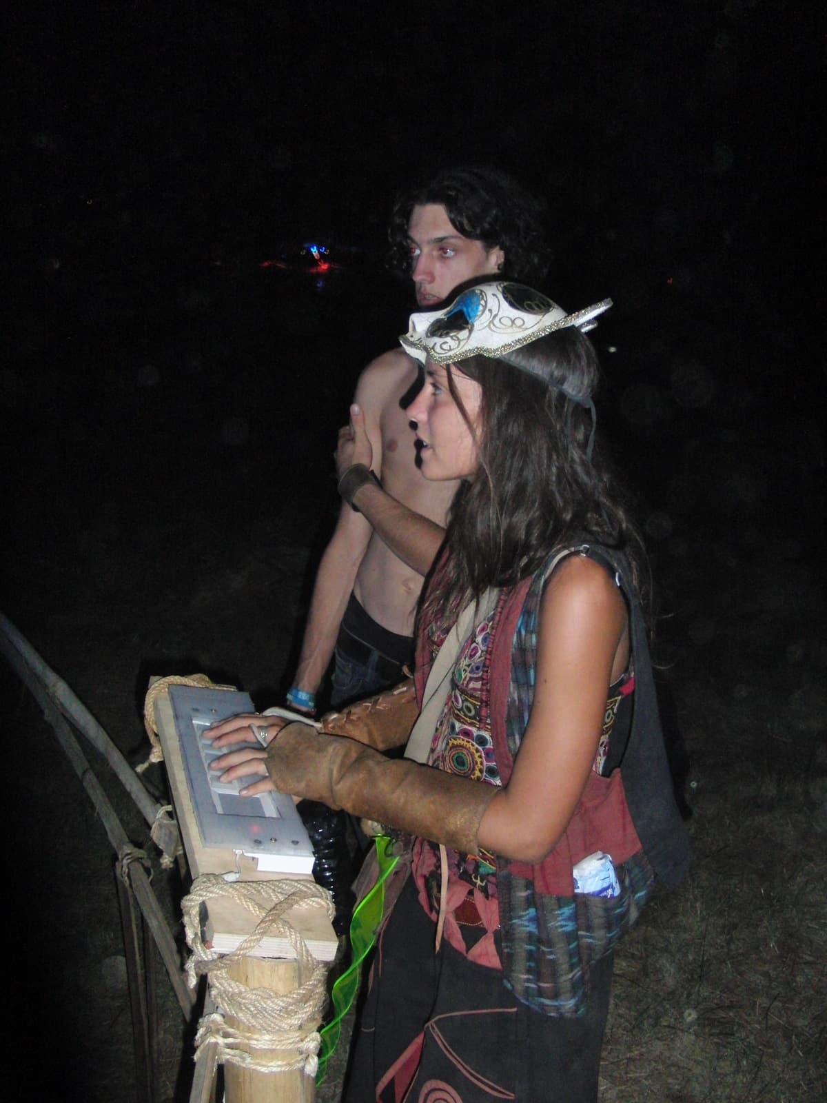 Two friends at the installation at night, Boom 2010