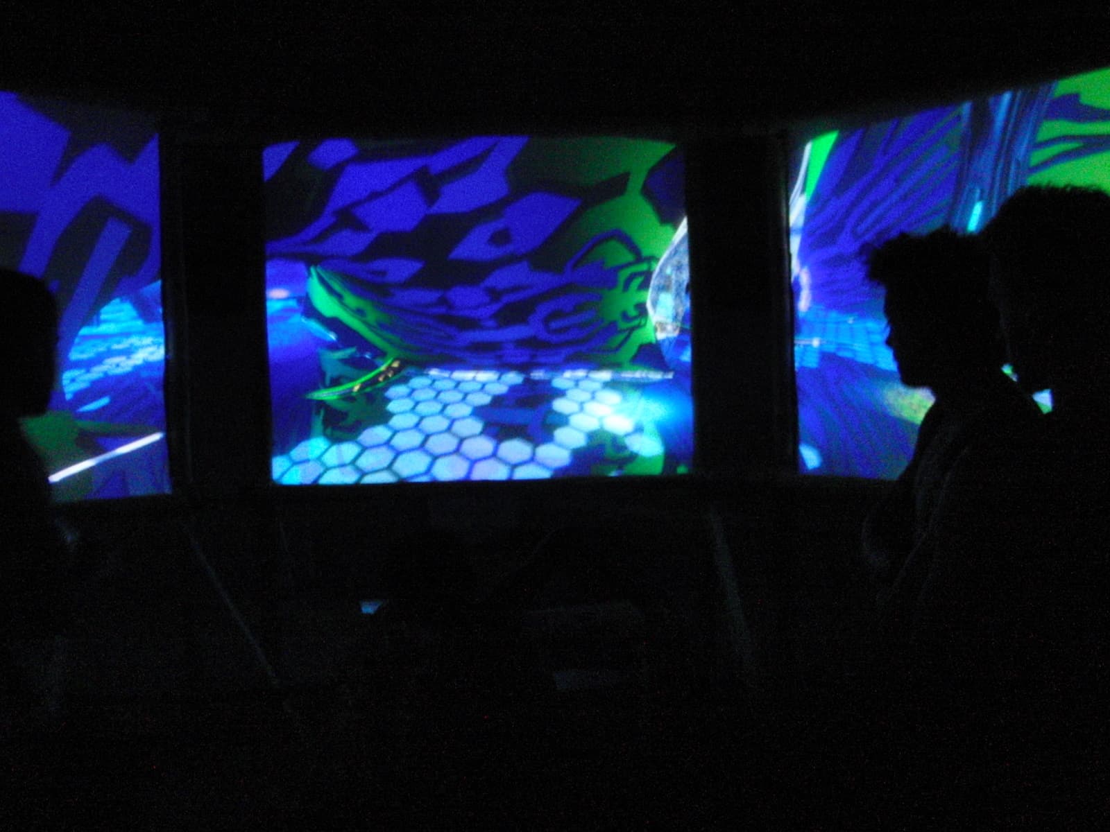 Projected patterns on screens in a dark room, Boom 2010