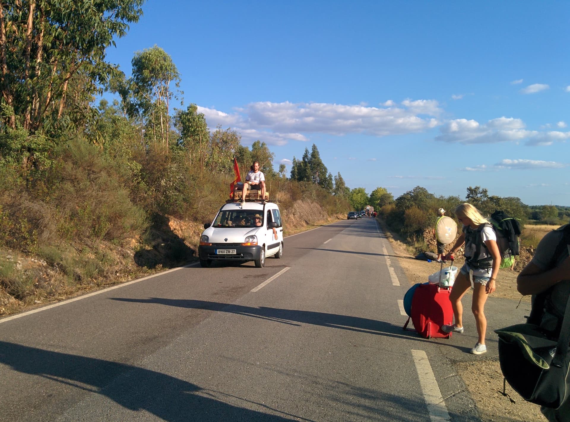 Hitching on the road away from the site, Boom 2014