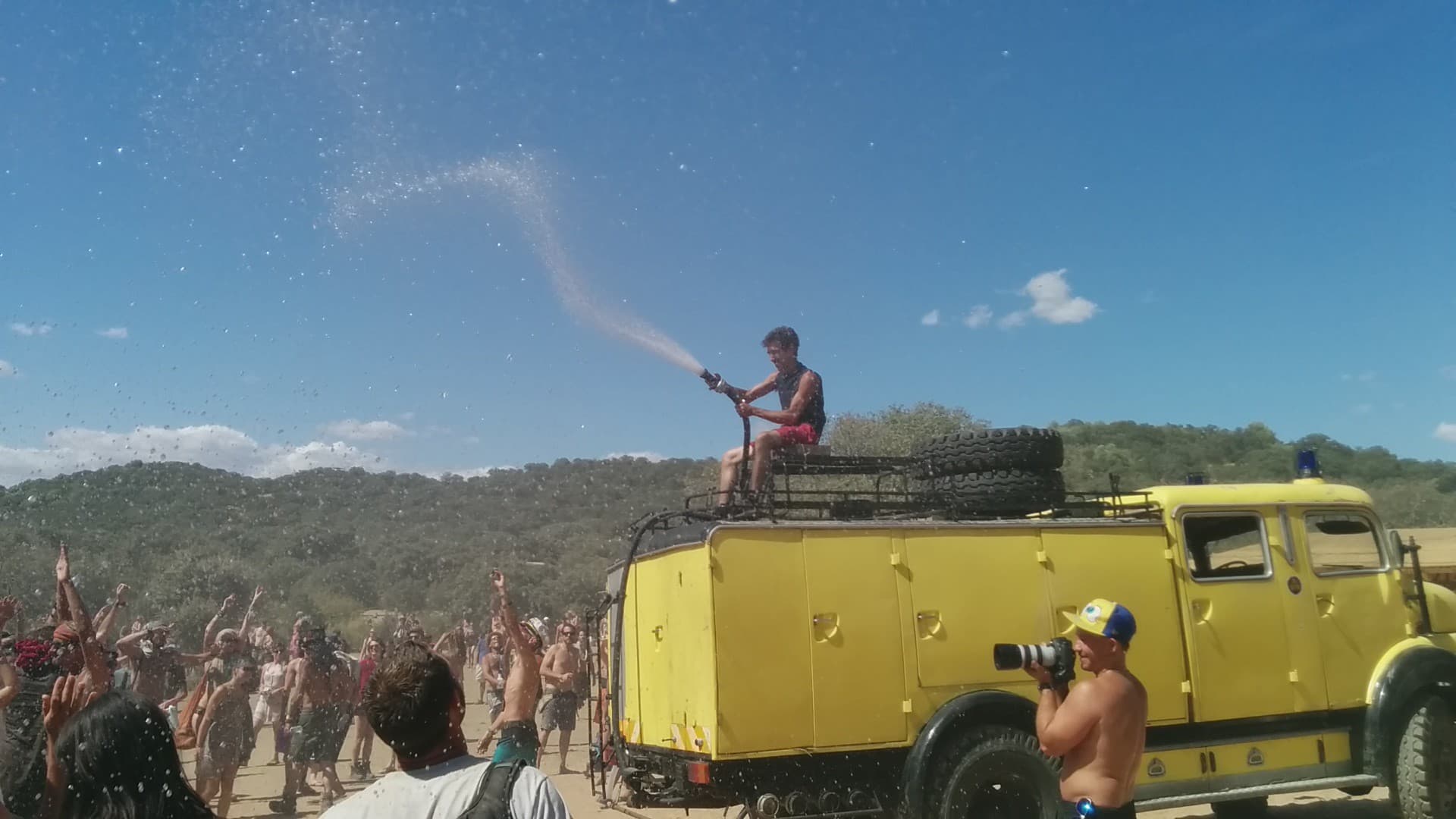 Water cannon spraying the crowd from a truck, Boom 2014