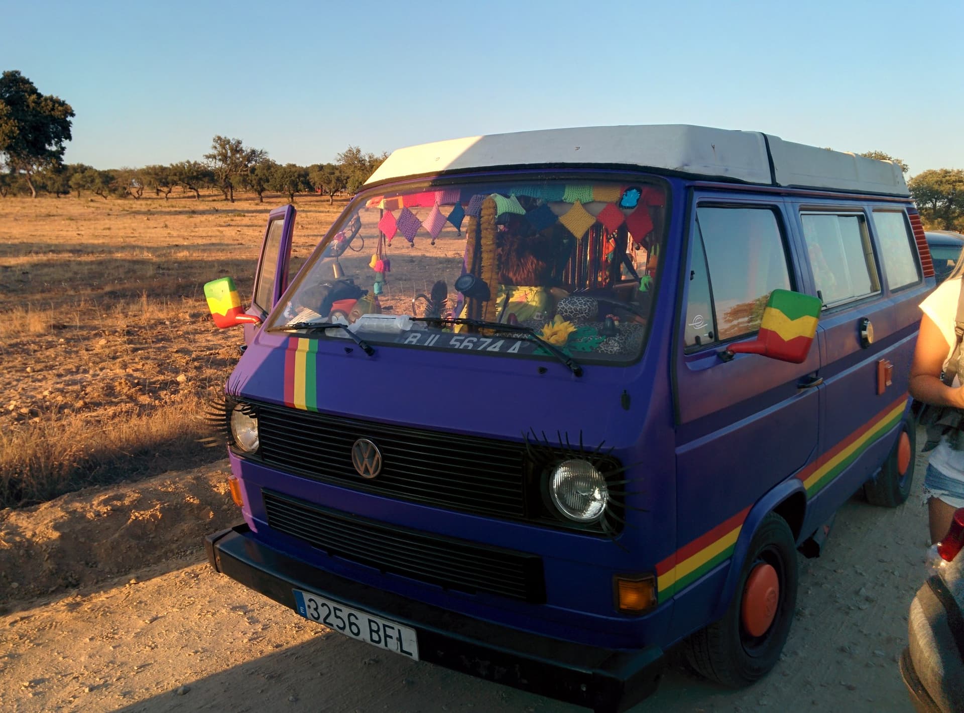 Painted camper van parked on the dry ground, Boom 2014