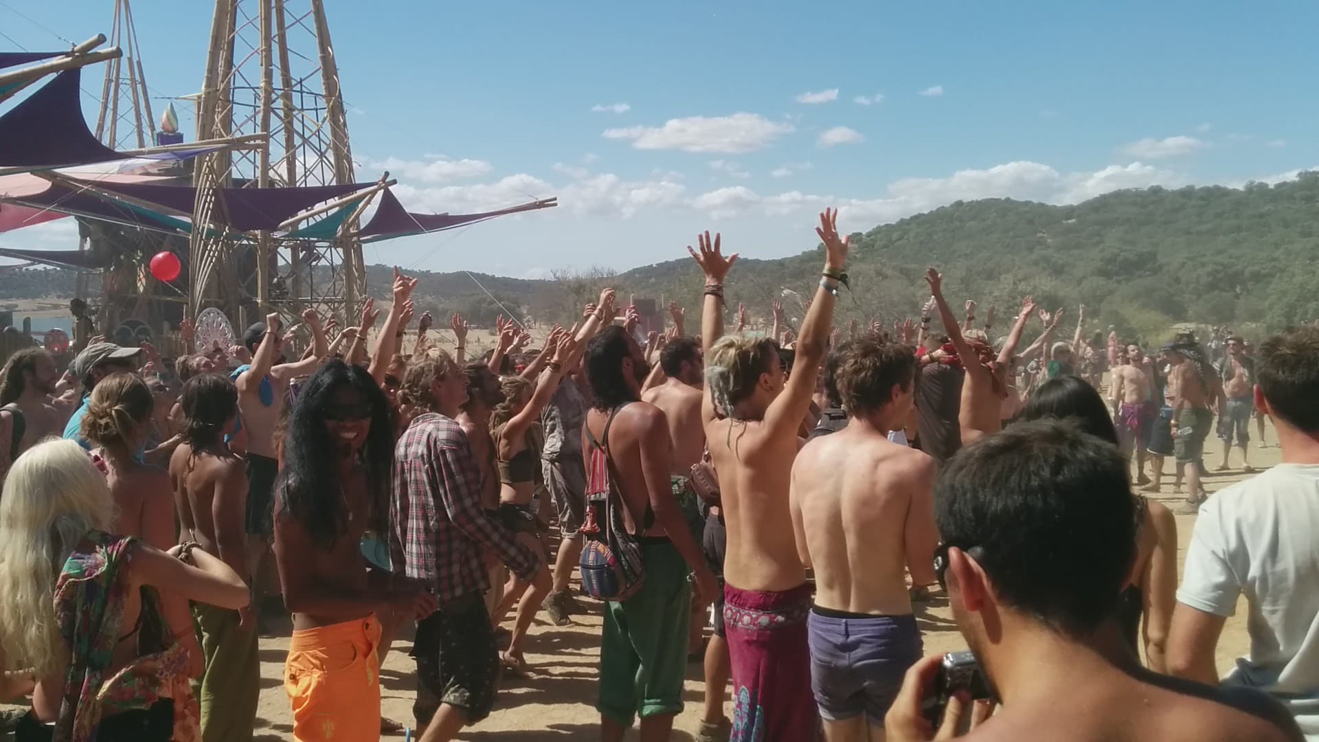 Arms raised in the crowd before the stage, Boom 2014