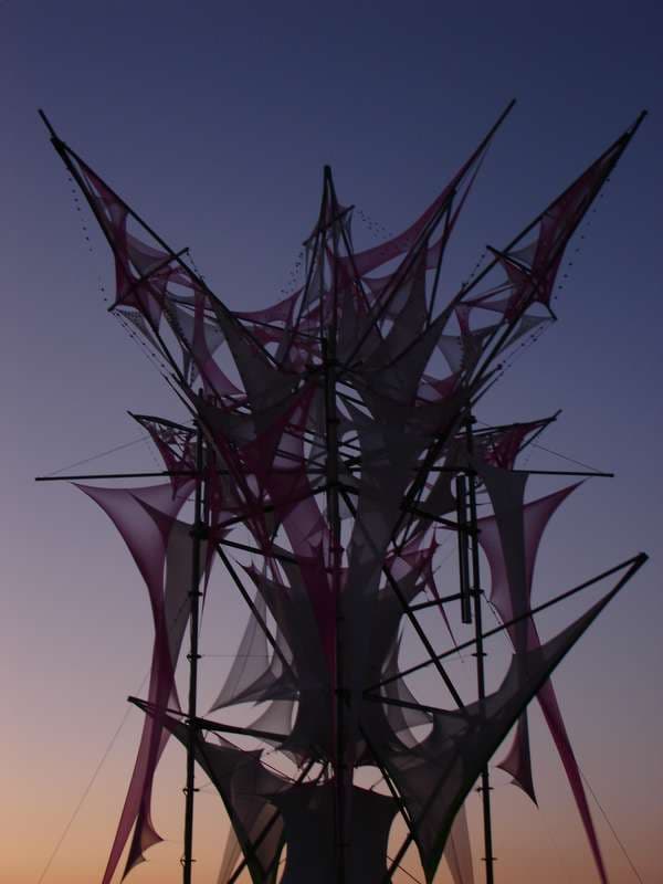 Sail sculpture silhouetted at dusk, Boom 2006