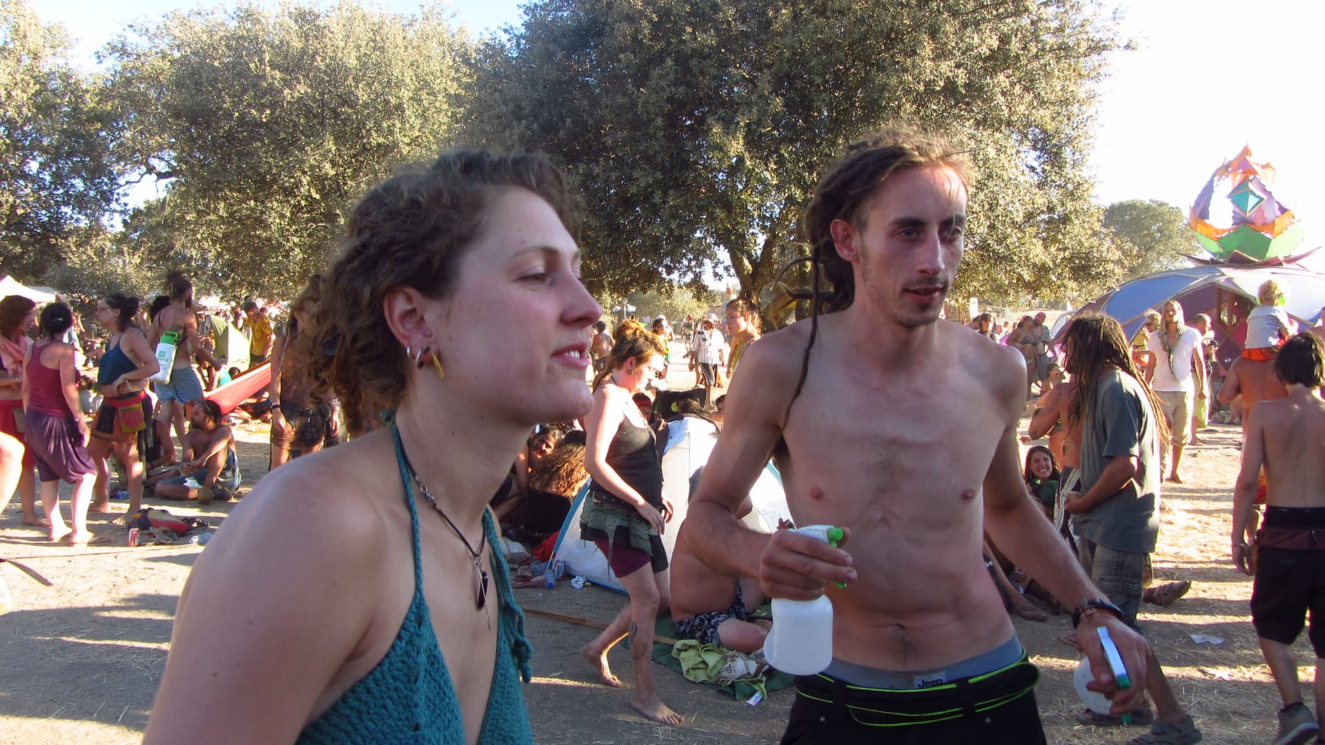 Walking through the crowd with drinks, Boom 2012