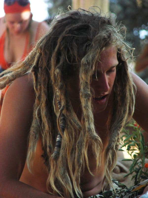 Visitor with dreadlocked hair at the festival