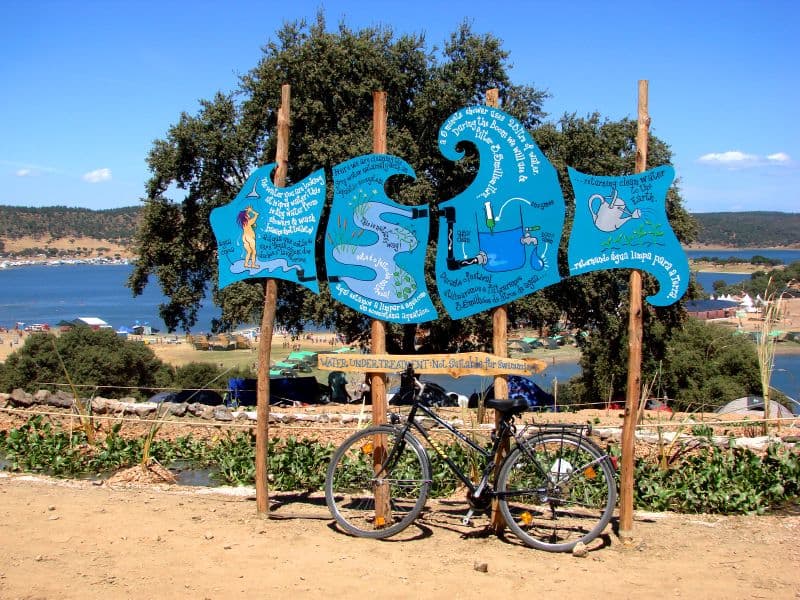 Painted signboard at the shoreline entrance