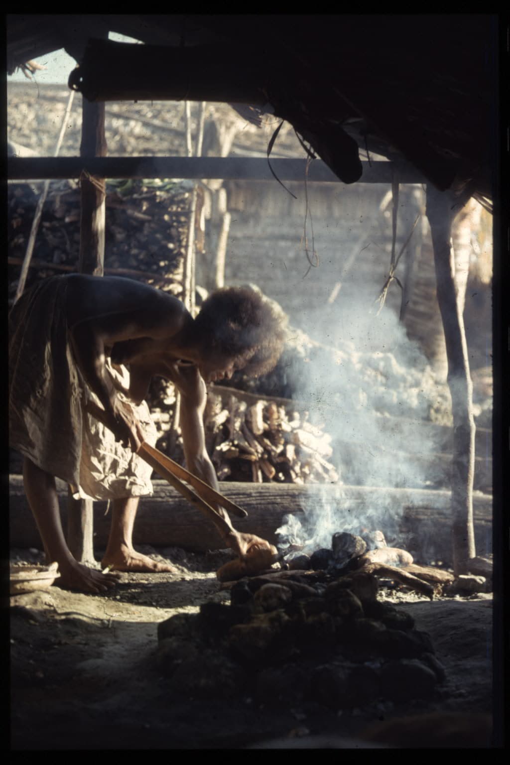 Woman cooking in the menstrual quarter, Foueda