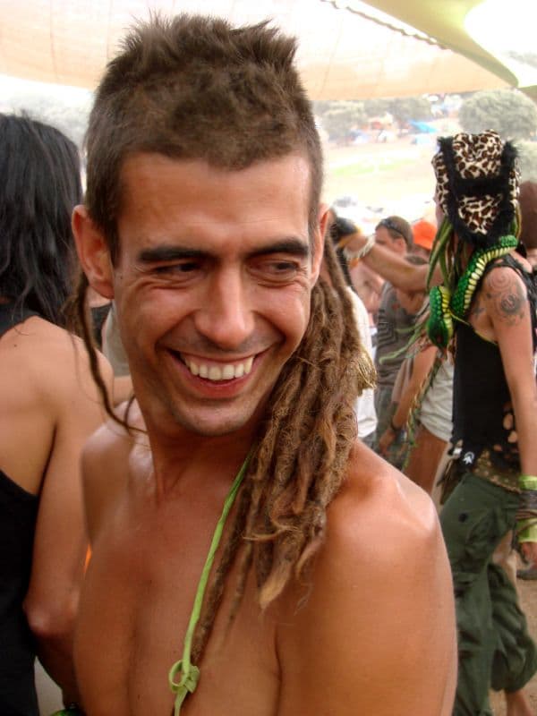 Smiling visitor with dreadlocks