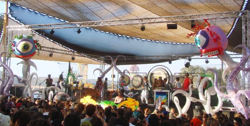 Crowd under the decorated main stage canopy