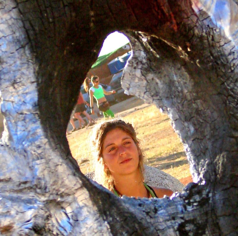 Visitor framed through a hole in a sculpture