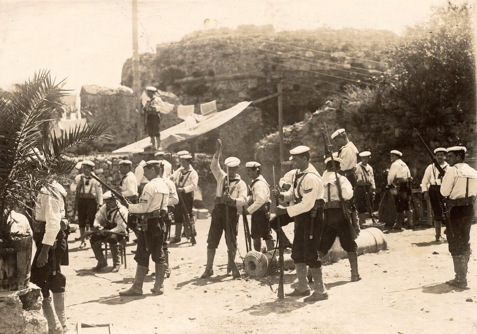 Sailors from the foreign warships prepare to land