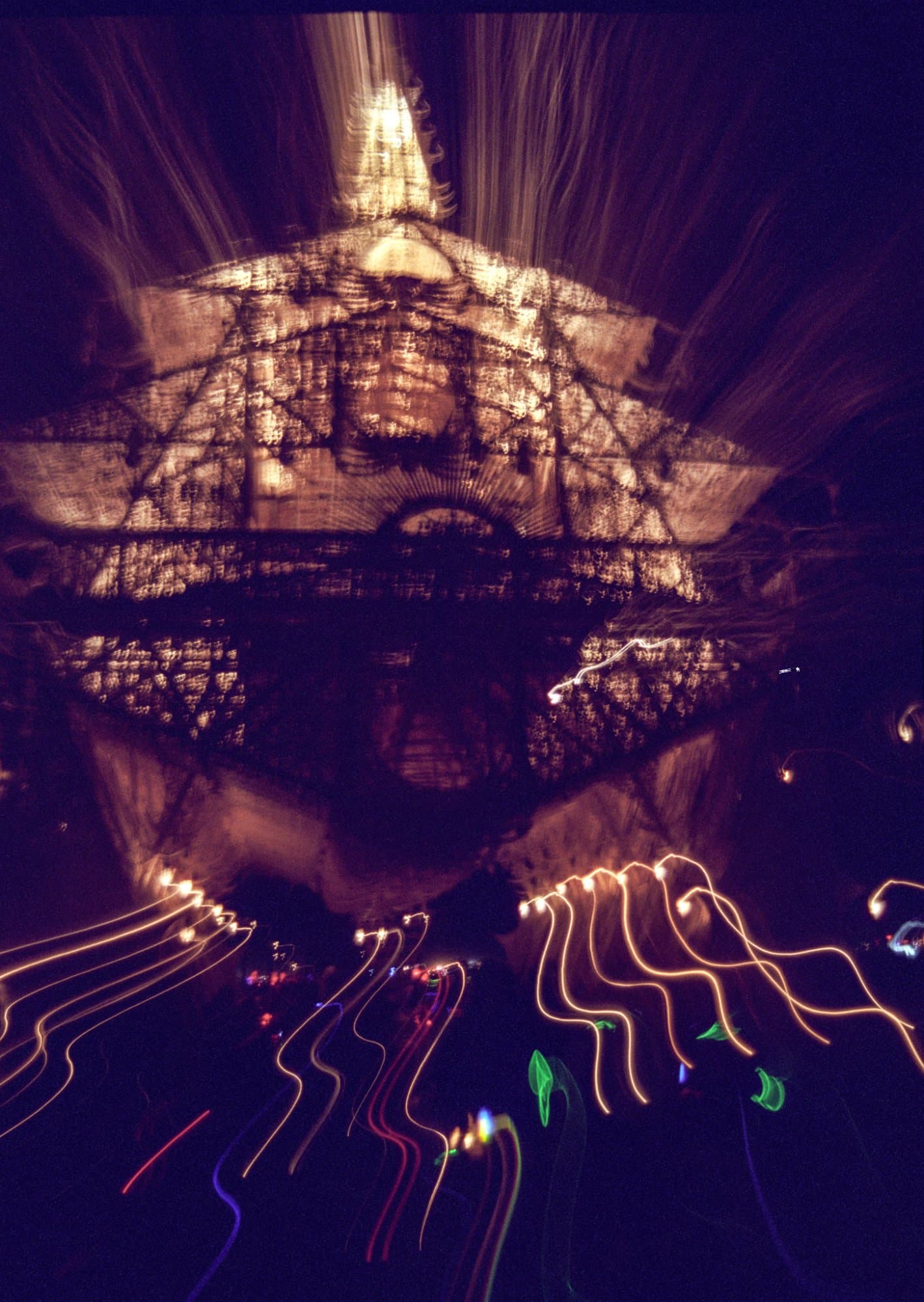 The Temple of Joy, lit at night · 2/7