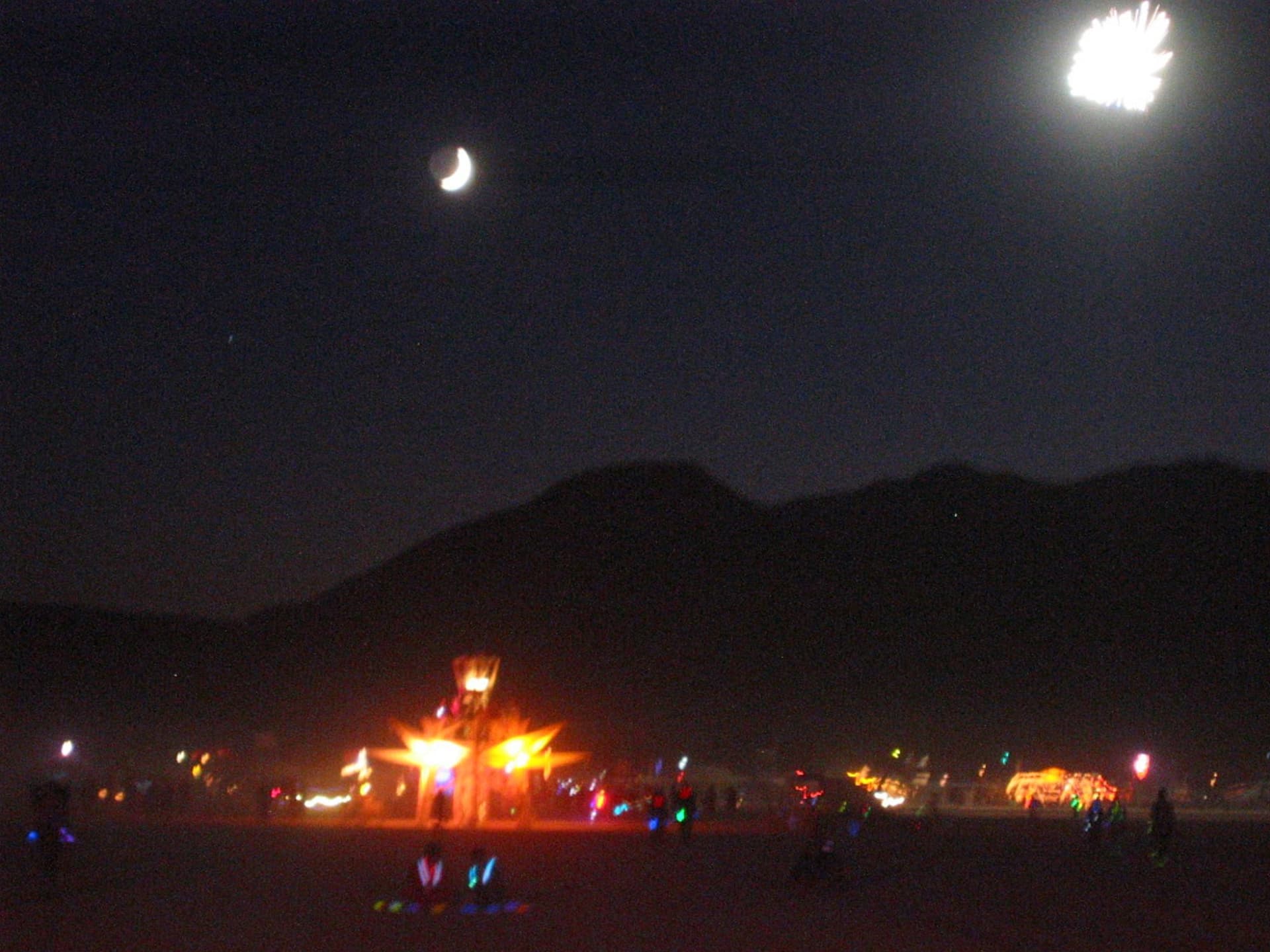 The Man over the burn-night crowd · 1/3
