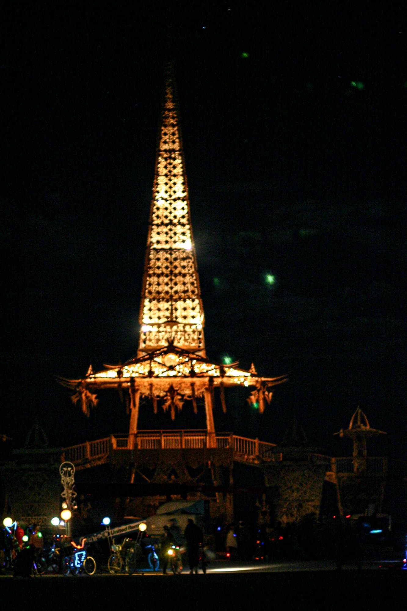Temple of Stars, lit at night · 2/6