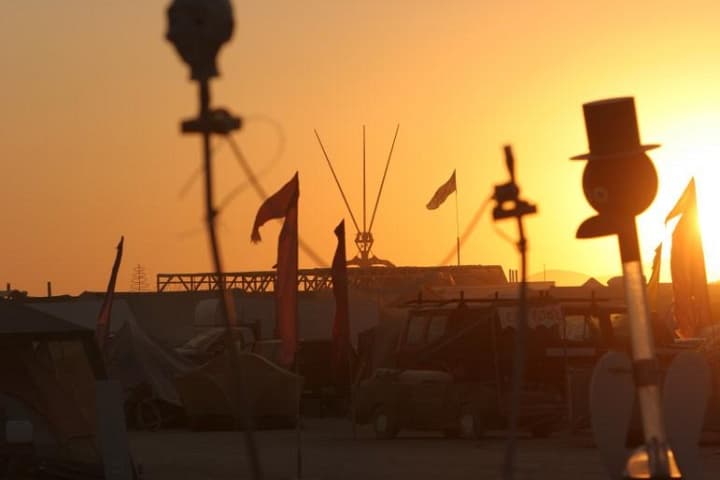 Sunset over the tent city · 7/9