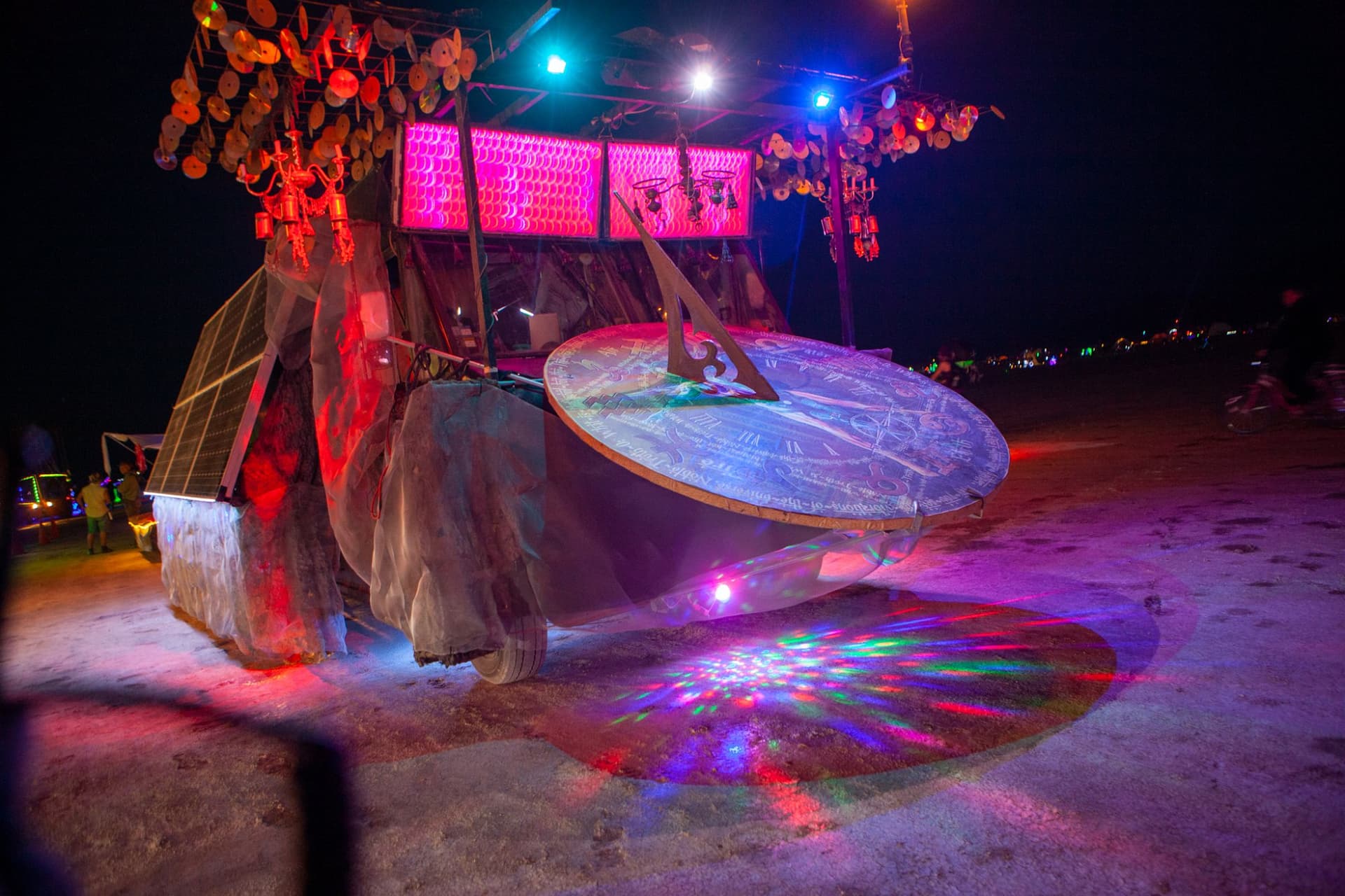 The neon art cars at night · 11/15