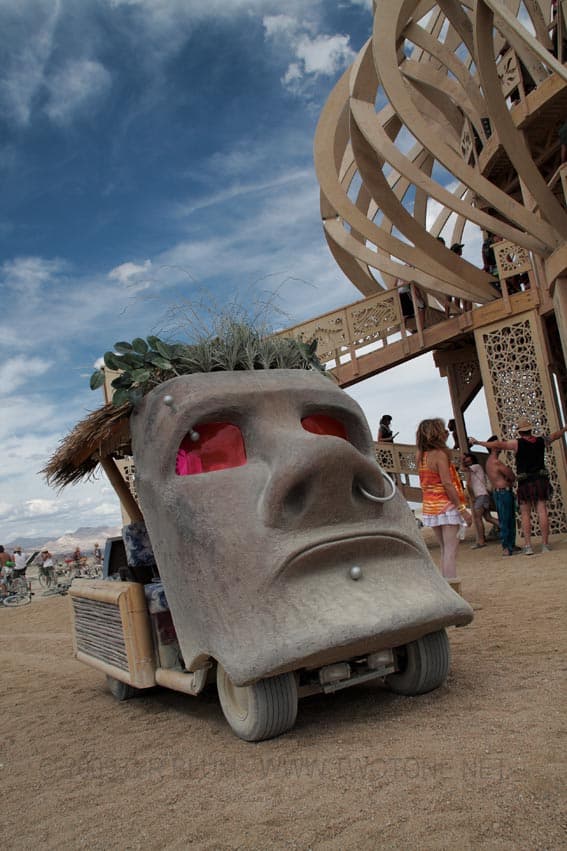 Easter Island Moai Head Art Car Below the Temple