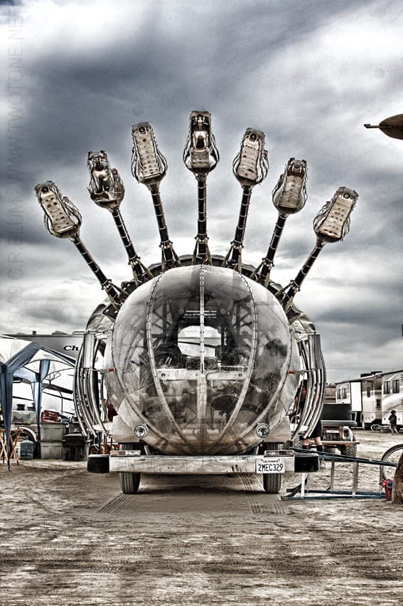 Chrome sphere mutant vehicle with mechanical serpent arms