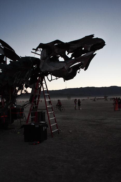 Dragon Sculpture Neck Repair at Dusk