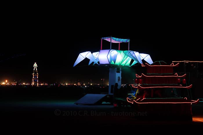 Illuminated Art Car and the Man at Night