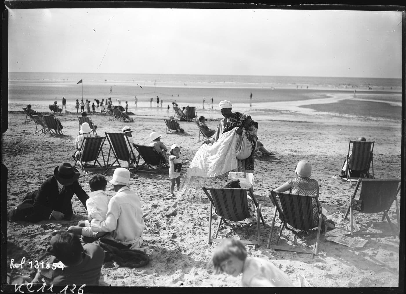 Carpet seller on the beach, Deauville