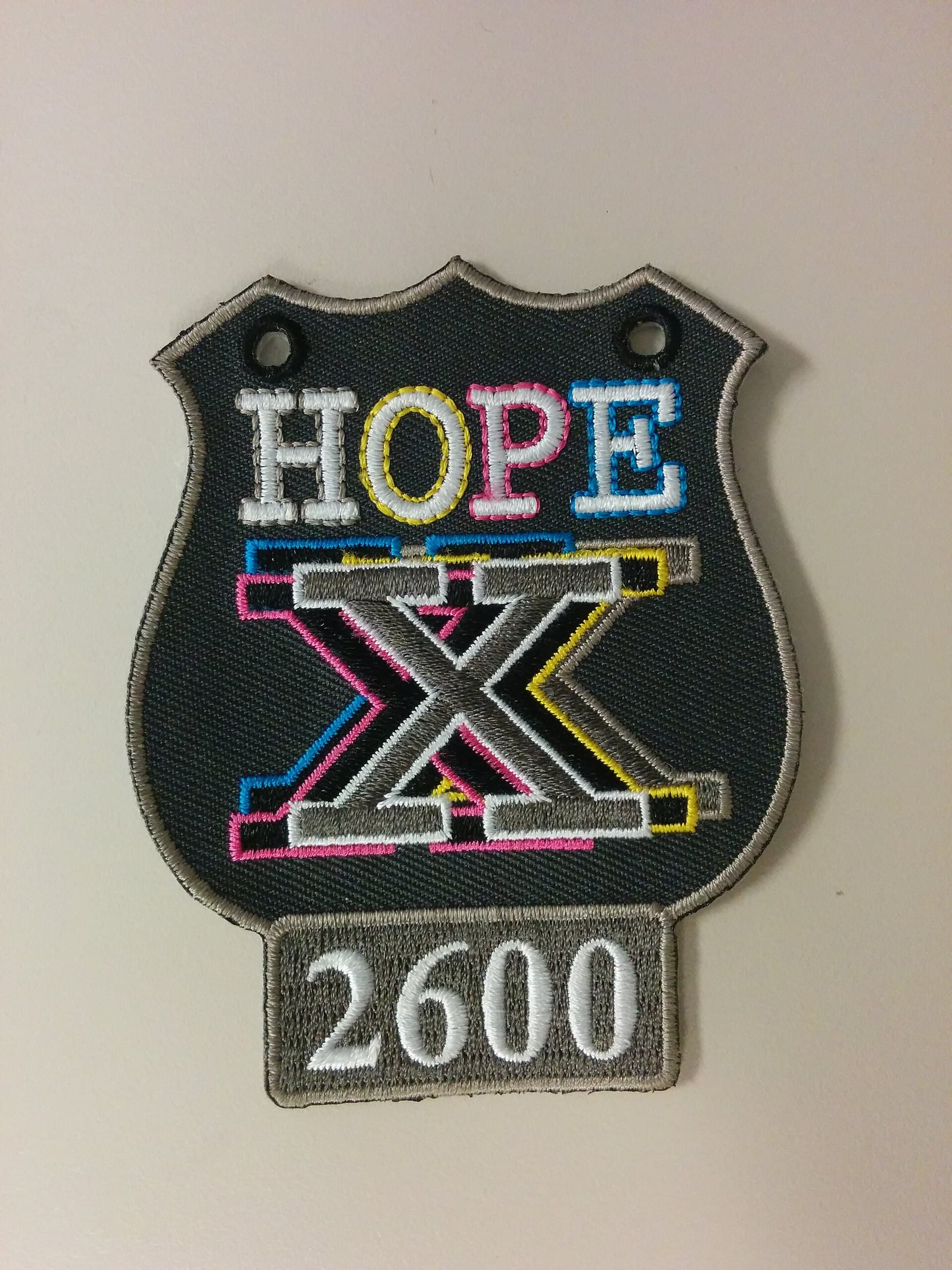 HOPE X conference badge, 2014