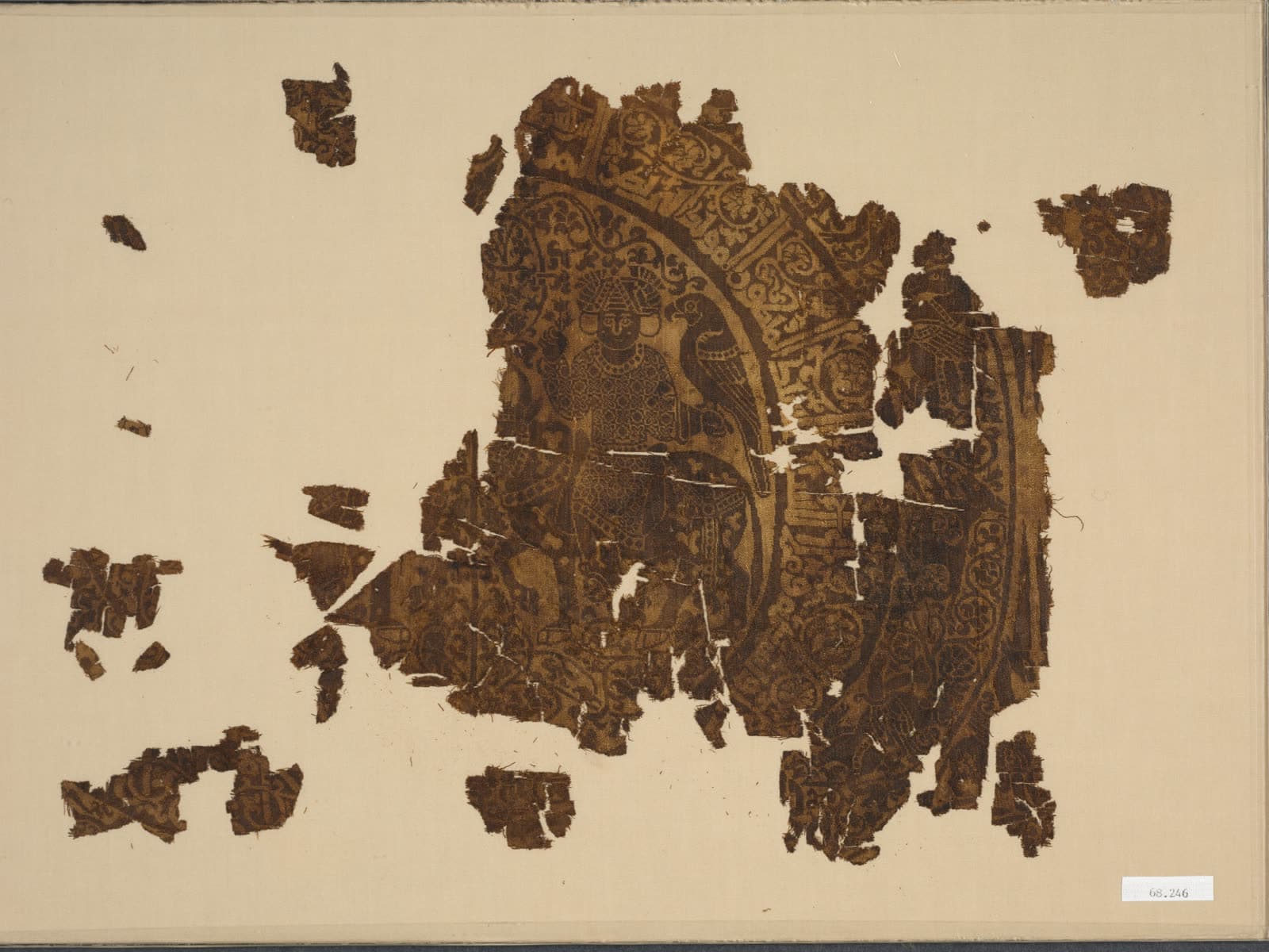 Fragment with falconer riding a bull in a rondel