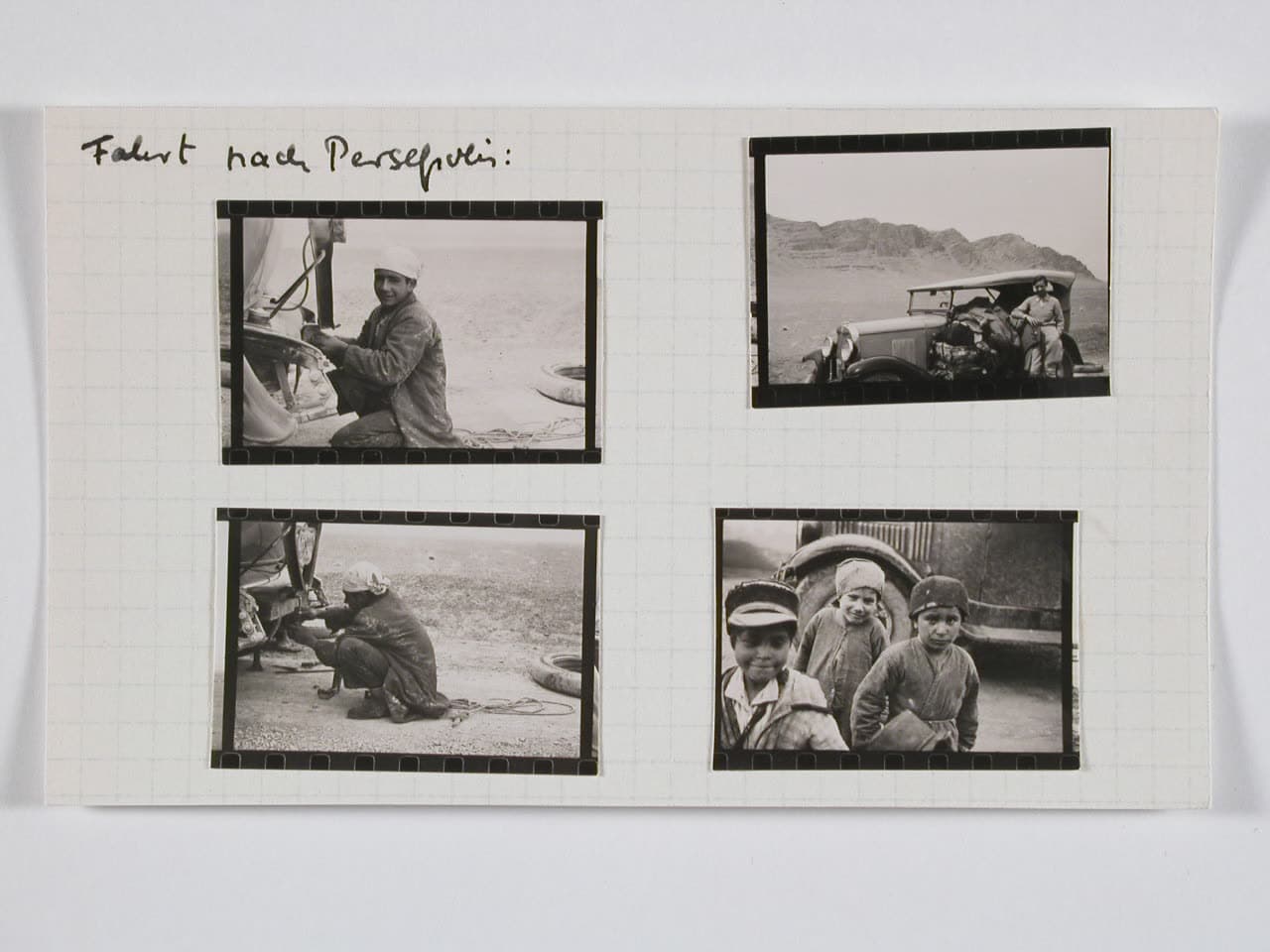 Annemarie Schwarzenbach's car at Persepolis, with children gathered around it
