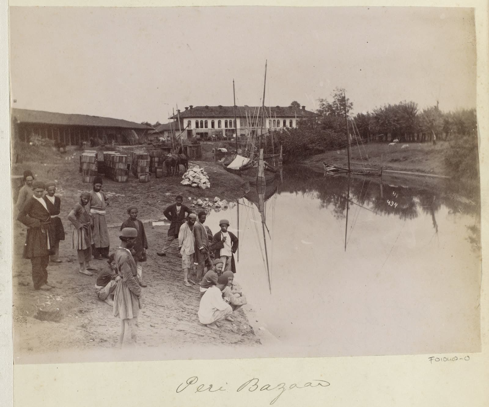 Men at the harbour of Peri Bazaar