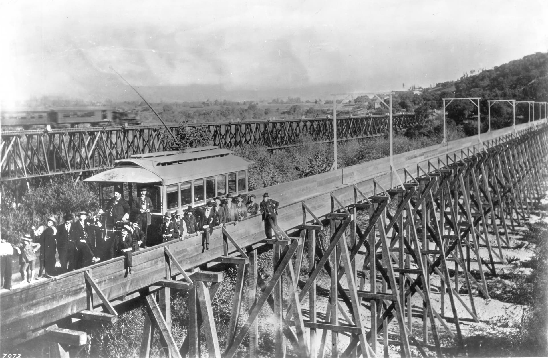 Bridge across the Arroyo Seco at Garvanza, showing the first cable-car to cross it, ca.1…