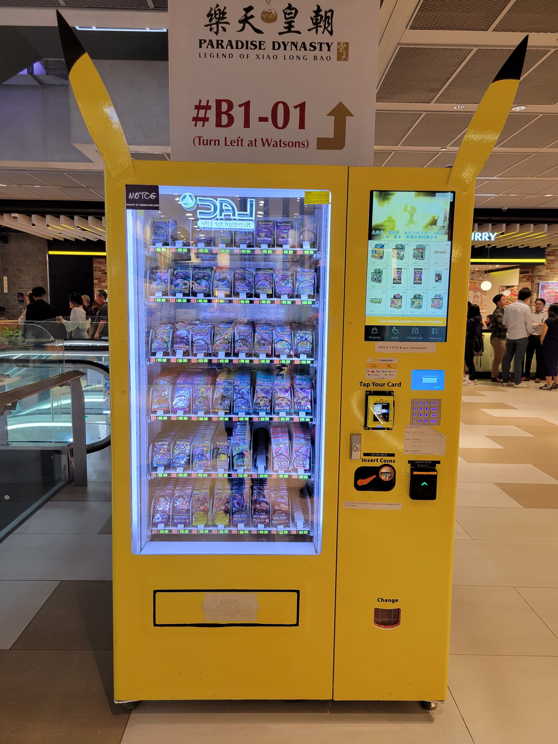 Card packs by vending machine, Singapore