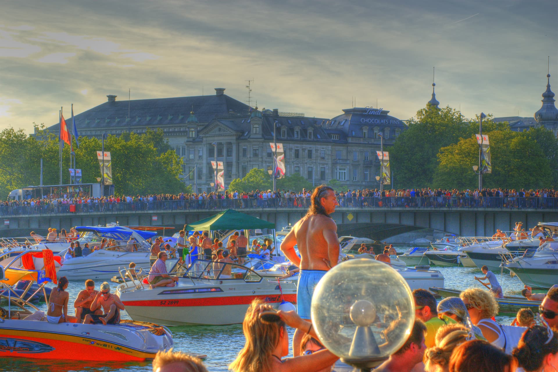 Boats and swimmers off the quay at Street Parade 2008