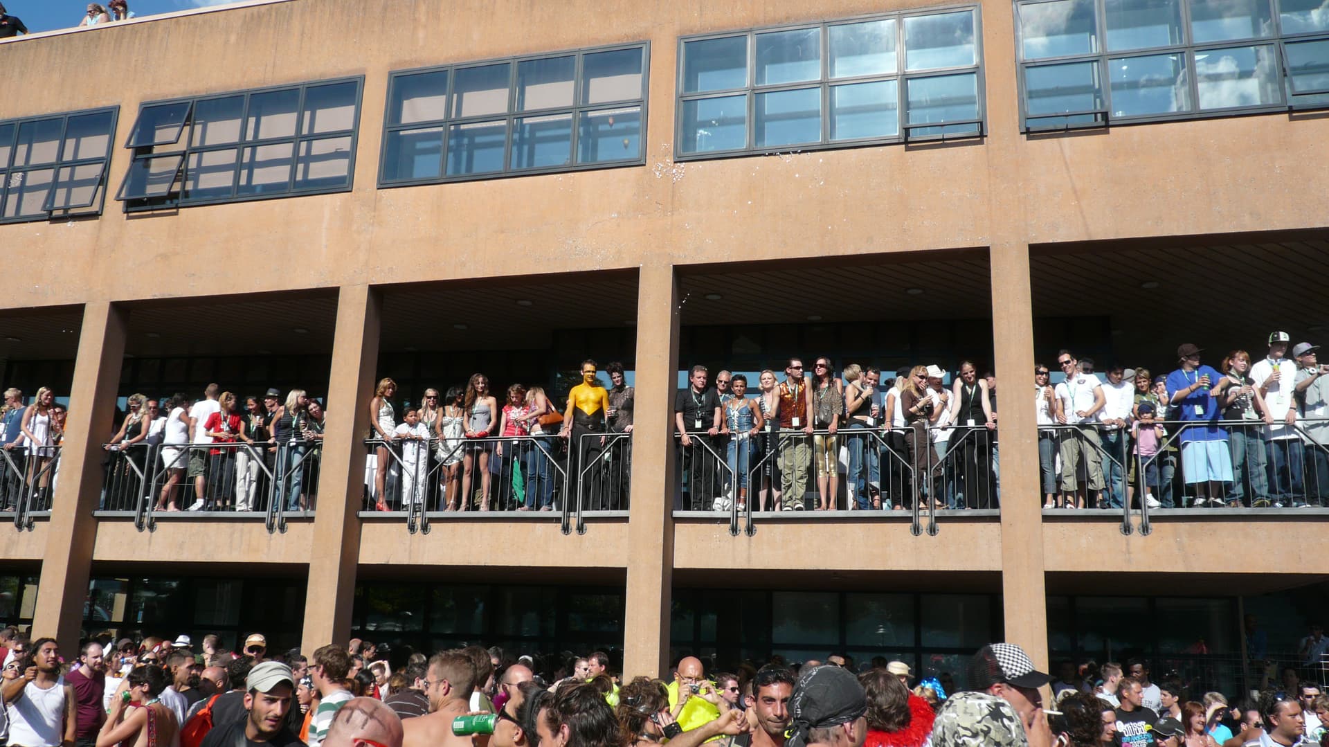 Spectators packed onto a building's balconies, 2008