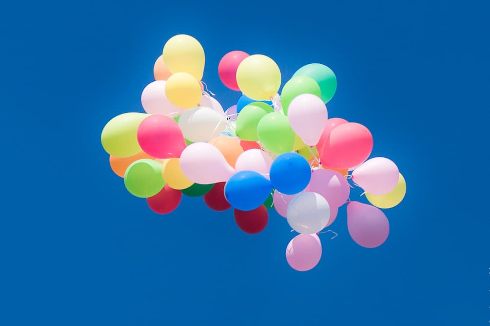 Balloons released over the parade, 2012