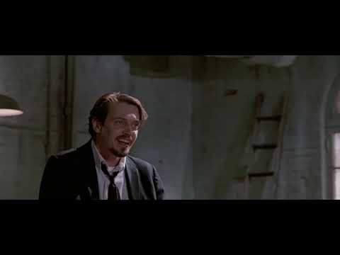 Reservoir Dogs: The Mexican-standoff finale โ three men point guns at each other in a triangle.