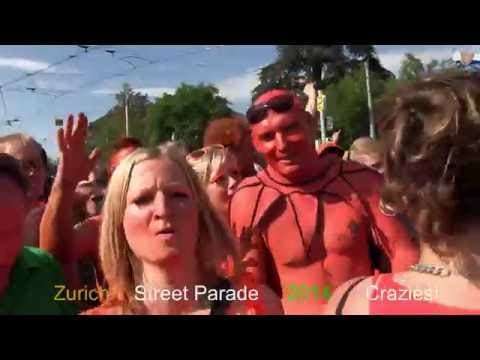 A visitor films the 2014 parade