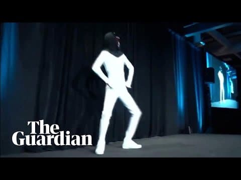 Elon Musk unveils plan for 'Tesla Bot' with man dancing in a bodysuit