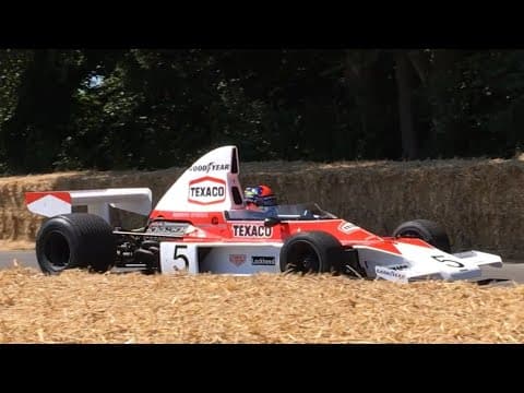 Lando Norris / Emerson Fittipaldi reunited with 1974 title-winning McLaren M23 | Goodwood FOS 2018